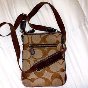 COACH signature cross body purse. Brown monogram